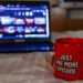Watching series with a cup of tea. Inscription Just one more episode. Millennial concept