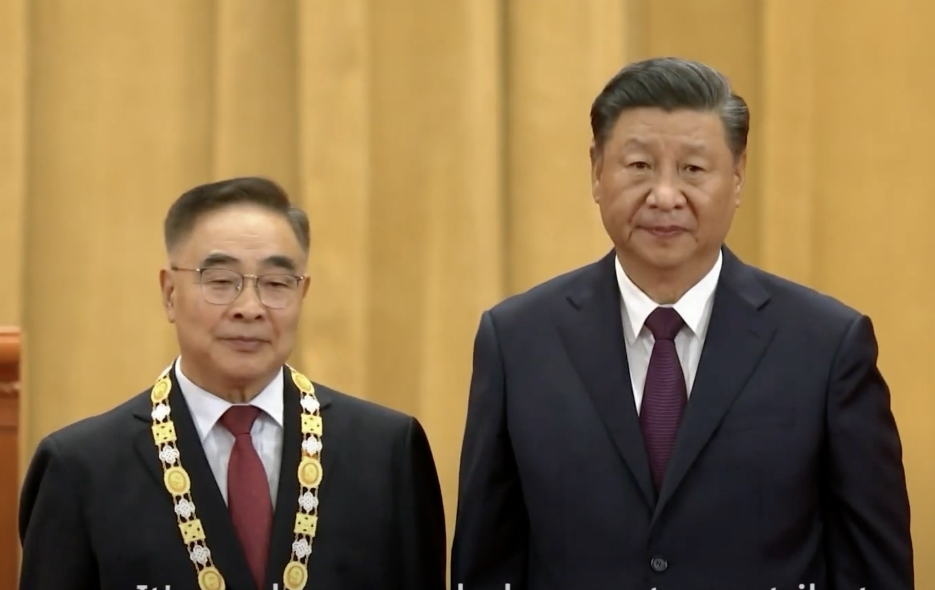 Zhang Boli, junto al presidente de China, Xi Jinping.