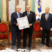 escarrer recibe la condecoracion de manos de abinader en reconocimiento a la labor de melia en rd