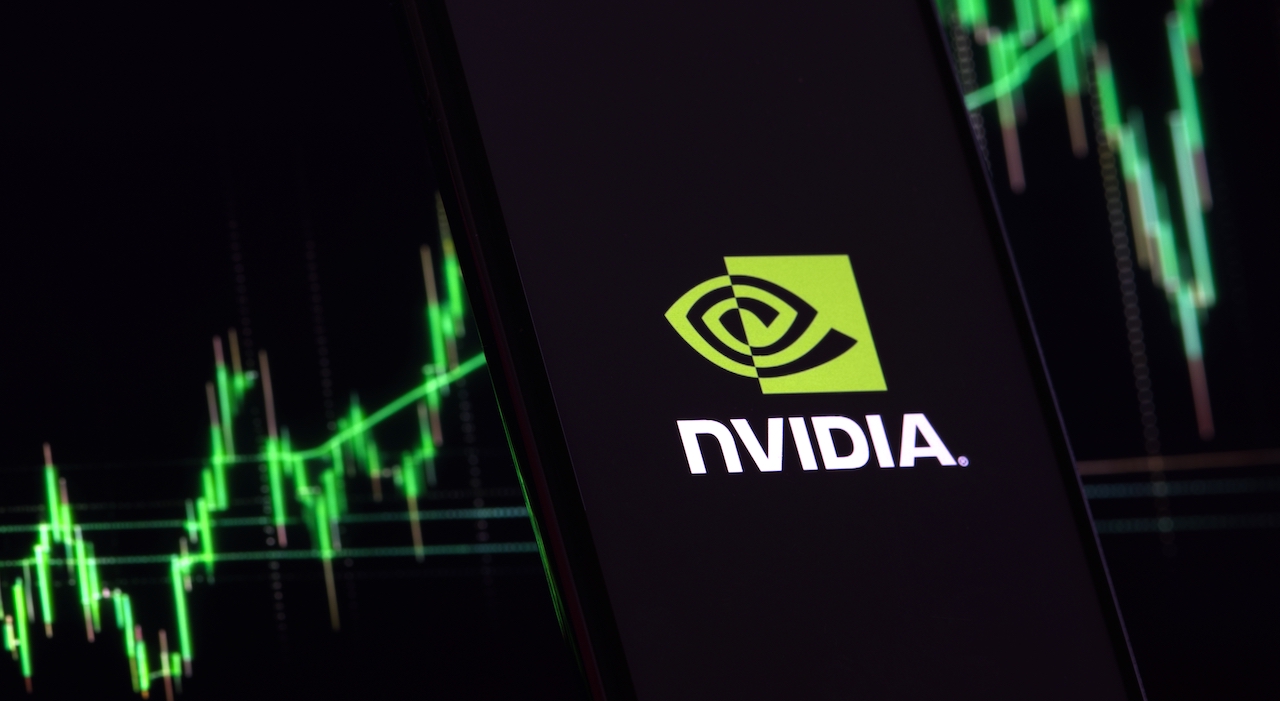 Nvidia investment growth and profit trading concept. Nvidia company logo on screen of smartphone against blurred background of up trading stock chart. USA, May 26, 2023